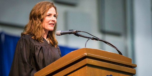 In this May 19, 2018, photo, Amy Coney Barrett, United States Court of Appeals for the Seventh Circuit judge, speaks during the University of Notre Dame's Law School commencement ceremony at the University of Notre Dame in South Bend, Ind. Barrett is considered one of the most likely picks to fill the vacant Supreme Court seat of late Justice Ruth Bader Ginsburg. (Robert Franklin/South Bend Tribune via AP)