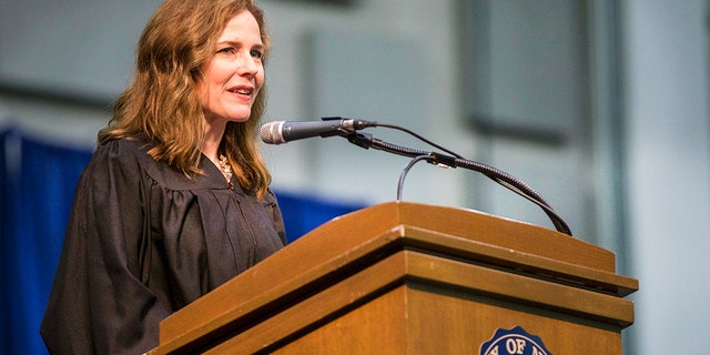 In this May 19, 2018, photo, Amy Coney Barrett, United States Court of Appeals for the Seventh Circuit judge, speaks during the University of Notre Dame's Law School commencement ceremony at the University of Notre Dame in South Bend, Ind. Barrett is considered one of the most likely picks to fill the vacant Supreme Court seat of late Justice Ruth Bader Ginsburg. (Robert Franklin/South Bend Tribune via AP)