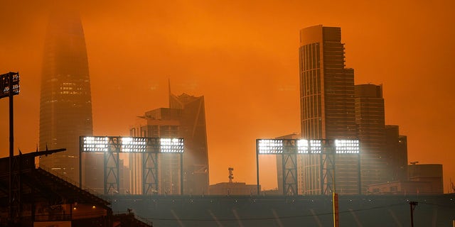 The skyline in the distance behind Oracle Park is partially visible with smoke from wildfires late Wednesday afternoon Sept. 9, 2020, in San Francisco. (Associated Press)