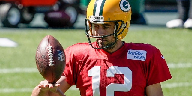 Aaron Rodgers is back with another Packers season. (AP Photo/Morry Gash)