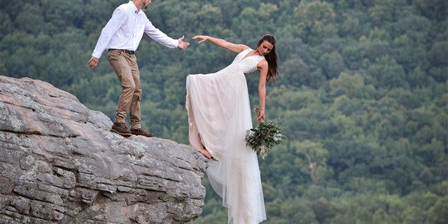 In another shot during the daring photoshoot taken by photographer Mason Gardner, Skye appears to be leaning backward over the edge, peering down at the ground below.