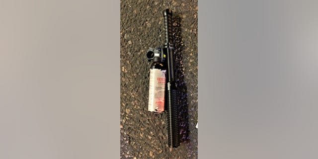 Photo shows bear spray and a baton obtained by law enforcement in Portland over weekend of unrest (Multnomah Co. Sheriff's Office)