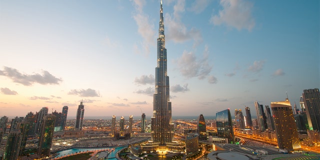 Dubai's Burj Khalifa rises high above the city and is known as the tallest building in the world.
