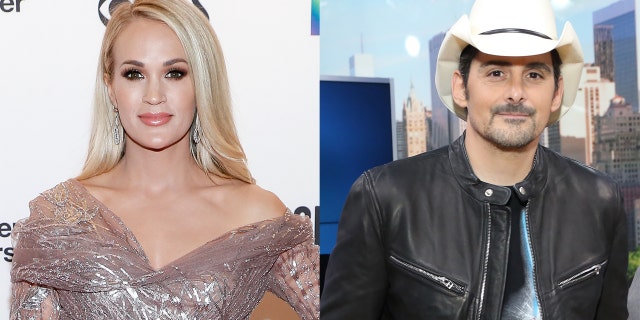 Country stars Carrie Underwood (left) and Brad Paisley performed together -- socially distanced -- at the Grand Ole Opry.