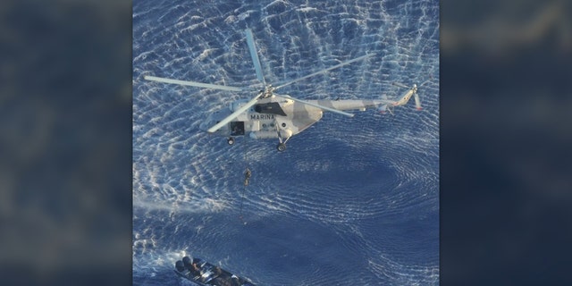 Photo shows Mexican Navy intercepting a boat federal prosecuotors say was was carrying more than three tons of cocaine. The Navy began tracking the boat in the Caribbean Sea Sept. 1.