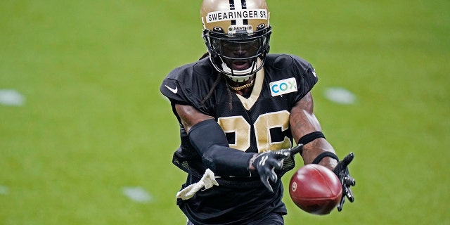 New Orleans Saints safety D.J. Swearinger (36) goes through drills during NFL football practice in New Orleans, Thursday, Sept. 3, 2020. (AP Photo/Gerald Herbert, Pool)