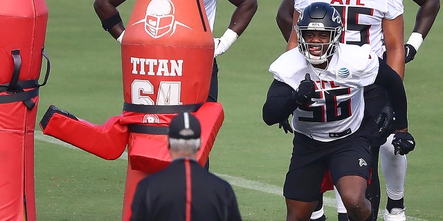 Atlanta Falcons defensive end Dante Fowler (56) runs a drill during NFL football training camp on Wednesday, Aug. 19, 2020, in Flowery Branch, Ga. (Curtis Compton/Atlanta Journal-Constitution via AP, Pool)