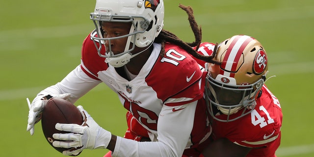 Arizona Cardinals wide receiver DeAndre Hopkins (10) catches a pass against San Francisco 49ers cornerback Emmanuel Moseley (41) during the first half of an NFL football game in Santa Clara, Calif., Sunday, Sept. 13, 2020. (AP Photo/Josie Lepe)