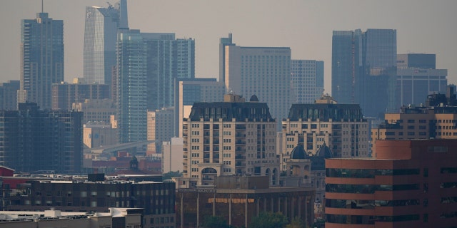 Smoke from several wildfires envelops the Denver skyline on Saturday, Sept. 26, 2020.