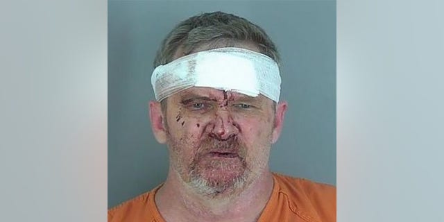 Douglas Lane was tackled by a group of fathers in the restaurant's parking lot, police reportedly say. (Spartanburg County Sheriff's Office)