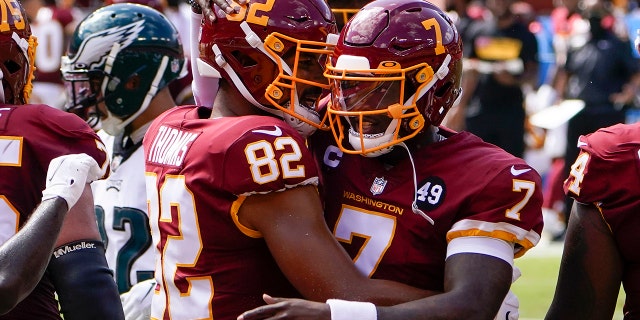 Washington Football Team tight end Logan Thomas (82) celebrates his touchdown against Philadelphia Eagles with teammate quarterback Dwayne Haskins (7), during the first half of an NFL football game, Sunday, Sept. 13, 2020, in Landover, Md. (AP Photo/Susan Walsh)