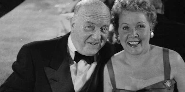 Actress Vivian Vance poses with co-star William Frawley during the Emmy Awards in Los Angeles, Calif., circa 1955.