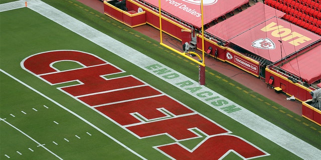 The saying "End Racism" is painted into the end zone on one side of the Chiefs stadium on Sept. 10, 2020, in Kansas City, Missouri.