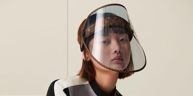 Louis Vuitton is debuting a gold-studded face shield next month
