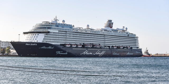The Mein Schiff 6 cruise ship is docked at Piraeus port, near Athens on Tuesday, Sept. 29. Greek authorities say 12 crew members on a Maltese-flagged cruise ship carrying more than 1,500 people on a Greek islands tour have tested positive for coronavirus and have been isolated on board. (Dimitris Lampropoulos/NurPhoto via Getty Images)
