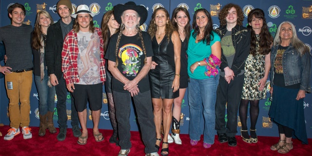 Trevor Nelson, Paula Nelson, Jacob Micah Nelson, Lukas Nelson, Amy Nelson, Willie Nelson, Annie D'Angelo, Raelyn Nelson, Rachel Fowler, Dean Hubbard, Martha Fowler, and Lana Nelson attend Hard Rock International's Wille Nelson Artist Spotlight Benefit Concert.