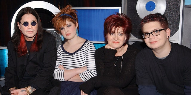 The Osbourne family backstage at TRL at the MTV Studios in New York City.  (L to R) Ozzy Osbourne, Kelly, Sharon, and Jack.