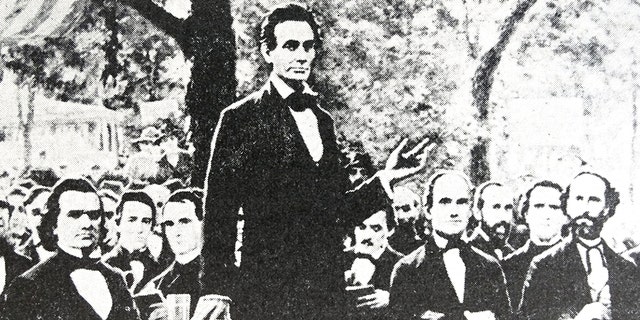 Abraham Lincoln in one of a series of seven debates regarding slavery with Stephen Douglas, left, his rival for a seat in the Senate. (Universal History Archive/UIG via Getty images)