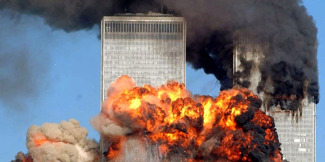 Hijacked United Airlines Flight 175 from Boston crashes into the south tower of the World Trade Center and explodes at 9:03 a.m. on September 11, 2001 in New York City. (Photo by Spencer Platt/Getty Images)