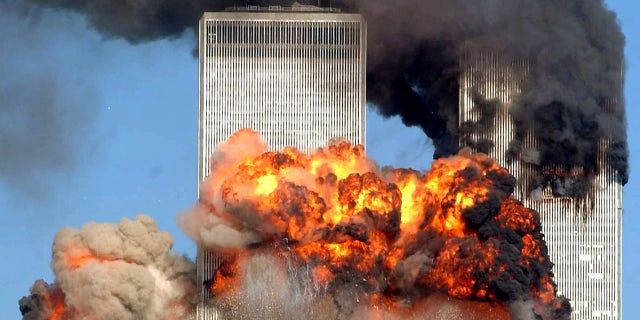 Hijacked United Airlines Flight 175 from Boston crashes into the south tower of the World Trade Center and explodes at 9:03 a.m. on September 11, 2001 in New York City. (Photo by Spencer Platt/Getty Images)