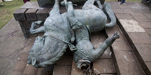 Colombian indigenous on Wednesday tore down a statue of Sebastian de Belalcazar, a 16th-century Spanish conquistador, with ropes in repudiation of the violence they have historically faced, according to their spokesmen. (Photo by JULIAN MORENO/AFP via Getty Images)
