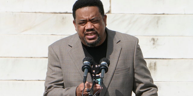 Bishop Talbert Swan, III speaks at the Lincoln Memorial during the "Commitment March: Get Your Knee Off Our Necks" protest against racism and police brutality, on August 28, 2020, in Washington DC. (Photo by JACQUELYN MARTIN/POOL/AFP via Getty Images)