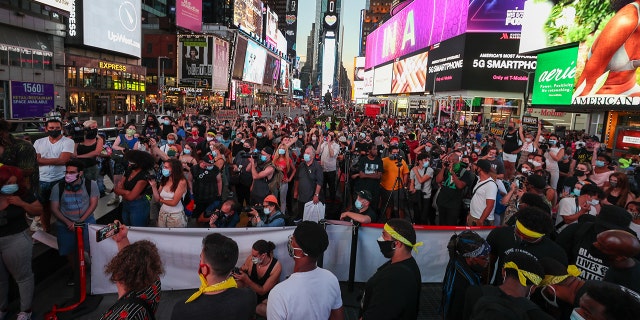 Black Lives Matter demonstrators gathered at Times Square to protest President Trump and Vice President Pence in New York City on September 4, 2020. (Photo by Tayfun Coskun/Anadolu Agency via Getty Images)