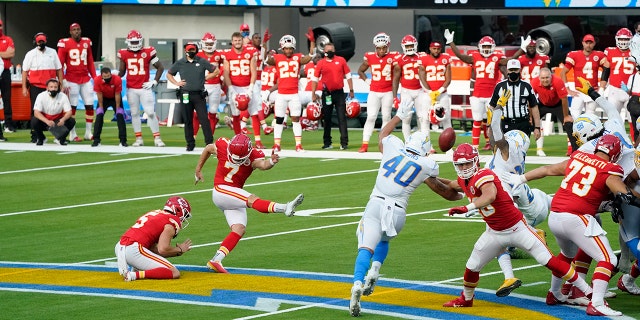 Kansas City Chiefs kicker Harrison Butker (7) hits the game-winning field goal during overtime of an NFL football game against the Los Angeles Chargers Sunday, Sept. 20, 2020, in Inglewood, Calif. Kansas City won 23-20. (AP Photo/Ashley Landis )
