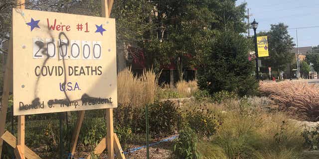 The anti-Trump display in referred to as the 'Coronavirus Death Scoreboard' was vandalized on evening of Sept. 22 in Northbrook, Ill.