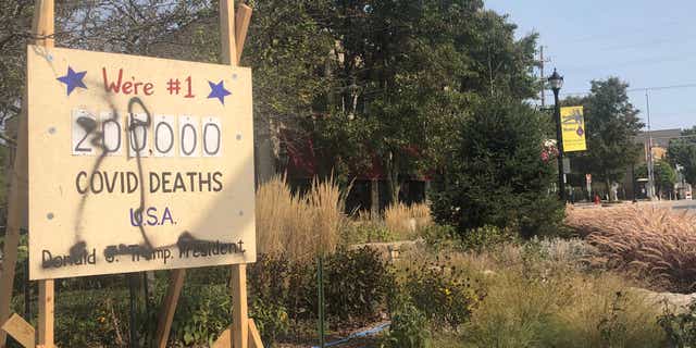 The anti-Trump display in referred to as the 'Coronavirus Death Scoreboard' was vandalized on evening of Sept. 22 in Northbrook, Ill.