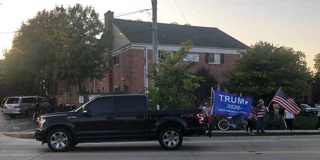 Several vehicles honked in support of President Trump during a demonstration on Sept. 25 in Northbrook, Ill.