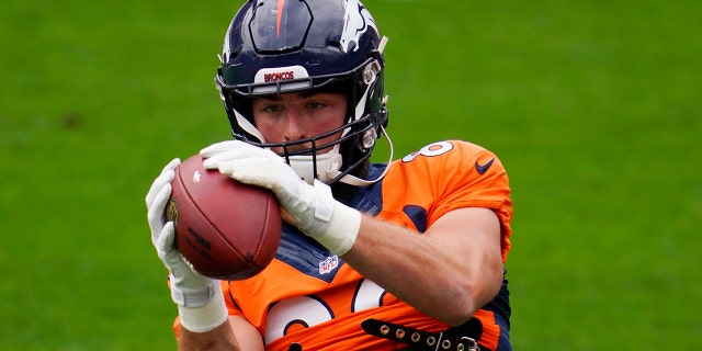 Denver Broncos tight end Jake Butt takes part in drills during an NFL football practice in empty Empower Field at Mile High, Saturday, Aug. 29, 2020, in Denver. (AP Photo/David Zalubowski)