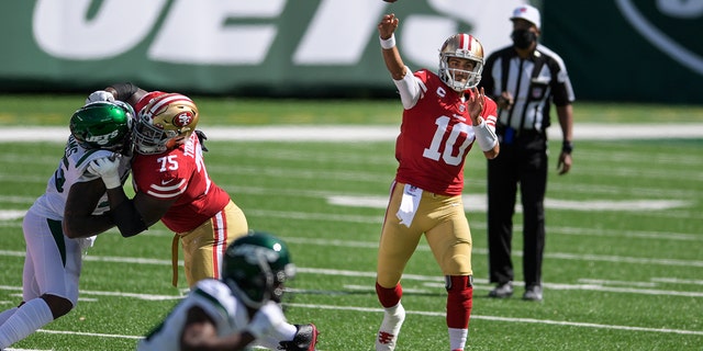 San Francisco 49ers quarterback Jimmy Garoppolo (10) throws a pass during the first half of an NFL football game against the New York Jets, Sunday, Sept. 20, 2020, in East Rutherford, N.J. (AP Photo/Bill Kostroun)
