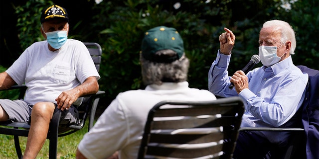 Democratic presidential candidate former Vice President Joe Biden speaks during an event with local union members in the backyard of a home in Lancaster, Pa., Monday, Sept. 7, 2020. (AP Photo/Carolyn Kaster)