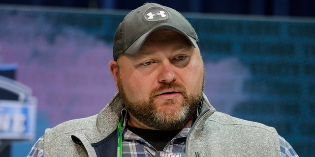 Joe Douglas says he made several moves to help the team get better, but he knows they're still very much a work in progress. (AP Photo/Michael Conroy, File)