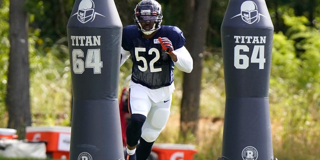 Chicago Bears linebacker Khalil Mack runs a drill during an NFL football camp practice in Lake Forest, Ill., Tuesday, Aug. 18, 2020. (AP Photo/Nam Y. Huh, Pool, File)