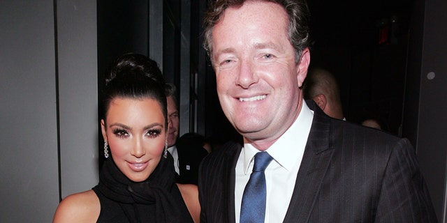 Kim Kardashian and Piers Morgan celebrate Kim Kardashian's appearance on 'The Apprentice' in 2010.