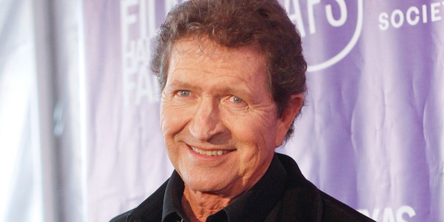 FILE - Musician Mac Davis appears at the Texas Film Awards in Austin, Texas on March 6, 2014. Davis, a country star and Elvis songwriter, died on Tuesday, Sept. 29, 2020 after heart surgery. He was 78. 