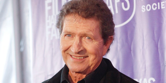 FILE - Musician Mac Davis appears at the Texas Film Awards in Austin, Texas on March 6, 2014. Davis, a country star and Elvis songwriter, died on Tuesday, Sept. 29, 2020 after heart surgery. He was 78.
