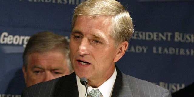 FILE - In questo luglio 17, 2004, file di foto, former GOP National Campaign Chairman Marc Racicot speaks at a news conference for a Bush-Cheney campaign event in Seattle. The former Montana governor and Republican National Committee chair said on Tuesday, Sett. 29, 2020, he will vote for Democrat Joe Biden in the November election, citing character flaws in President Donald Trump. (AP Photo/Jim Bryant, File)