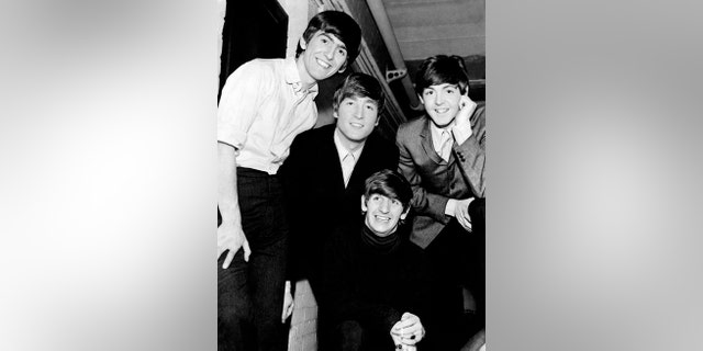 Portrait of English band The Beatles, the singers and musicians John Lennon, Paul McCartney, George Harrison and Ringo Starr .