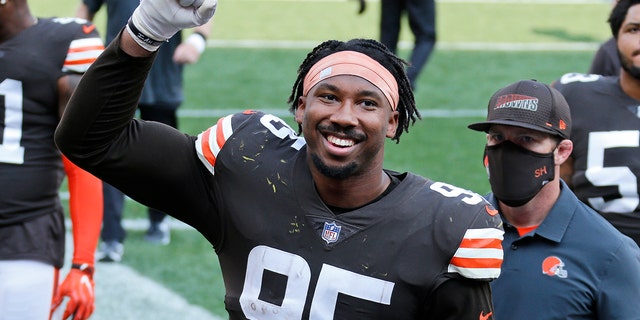 Cleveland Browns defensive end Myles Garrett celebrates after the Browns defeated the Washington Football Team in an NFL football game, Sunday, Sept. 27, 2020, in Cleveland. (AP Photo/Ron Schwane)
