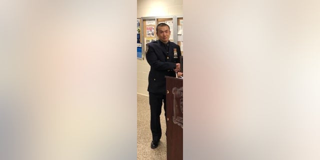 New York Police officer Baimadajie Angwang, 33, is accused of working for the Chinese government who agreed to spy on supporters of the free Tibet movement.