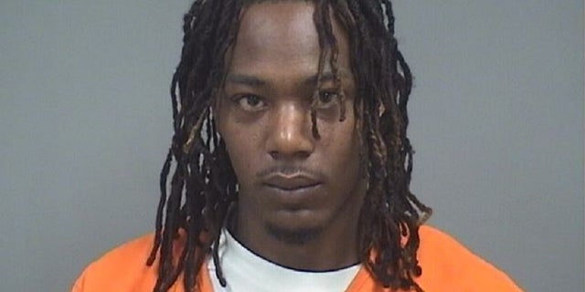 Kimonie Bryant, 24, is charged in connection with a shooting that killed a 4-year-old boy and wounded four adults early Monday.