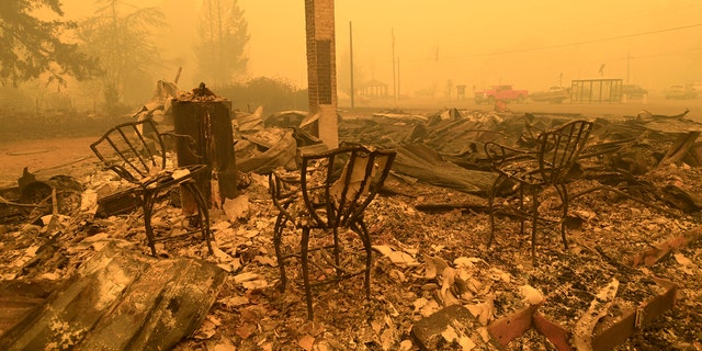 Three chairs are all that remain at the Gates Post office in Gates, Ore., Wednesday Sept 9, 2020.
