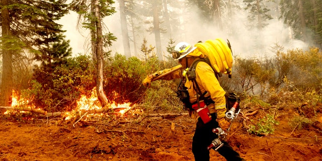 Firefighters trying to contain the massive wildfires in Oregon, California and Washington state are constantly on the verge of exhaustion as they try to save suburban houses, including some in their own neighborhoods.