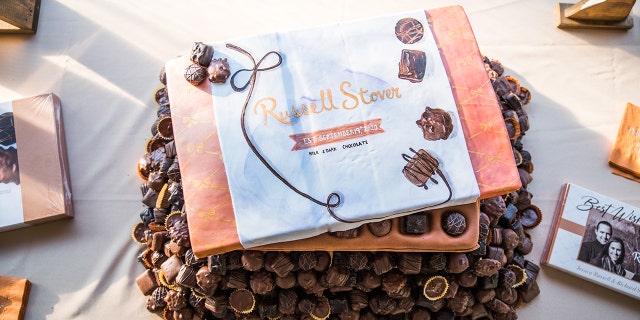 The cake was a highlight for both the bride and groom, which was a bespoke wedding cake designed by Russell Stover.