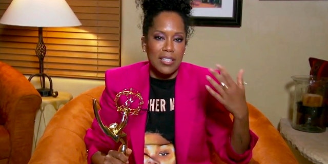 In this video grab captured on Sept. 20, 2020, courtesy of the Academy of Television Arts & Sciences and ABC Entertainment, Regina King accepts the award for outstanding lead actress in a limited series or movie for "Watchmen" during the 72nd Emmy Awards broadcast.