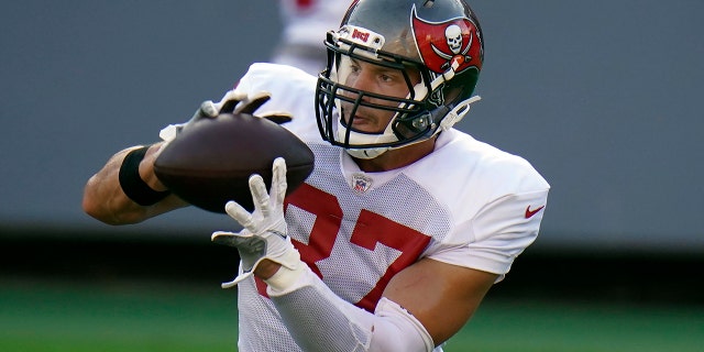 Tampa Bay Buccaneers tight end Rob Gronkowski (87) makes a catch during an NFL football training camp practice Friday, Aug. 28, 2020, in Tampa, Fla. (AP Photo/Chris O'Meara)