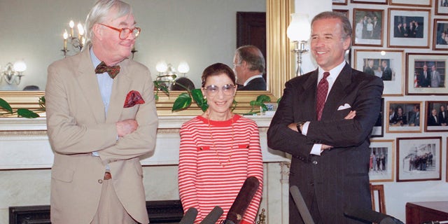 In this June 15, 1993, file photo, Judge Ruth Bader Ginsburg poses with Sen. Daniel Patrick Moynihan, D-N.Y., left, and Sen. Joseph Biden, D-Del., chairman of the Senate Judiciary Committee on Capitol Hill in Washington. 